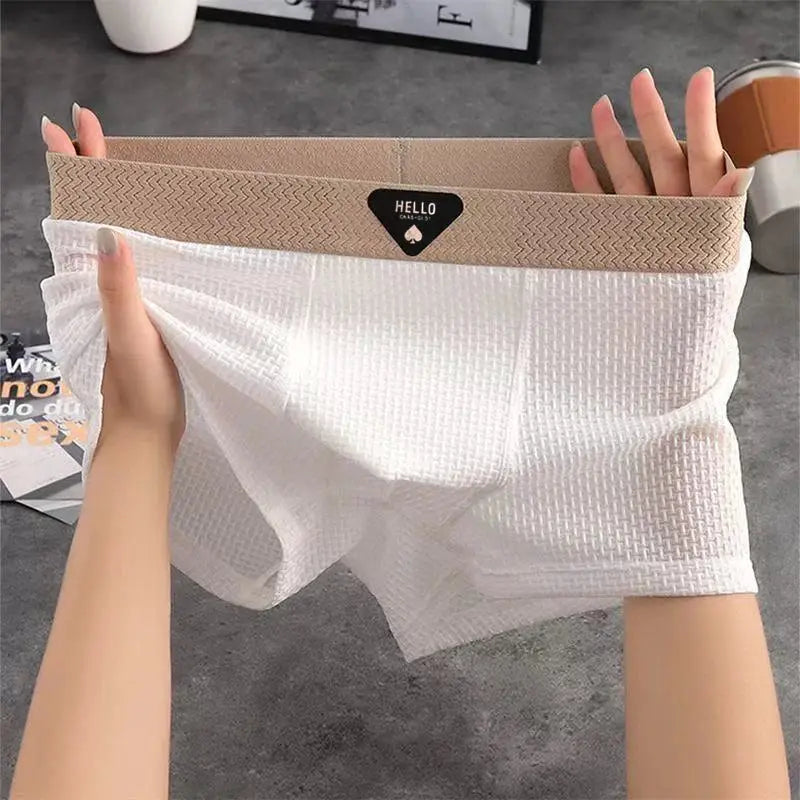 Men's boxer shorts in white ice-silk fabric with a beige elastic waistband featuring a HELLO logo, breathable and comfortable.