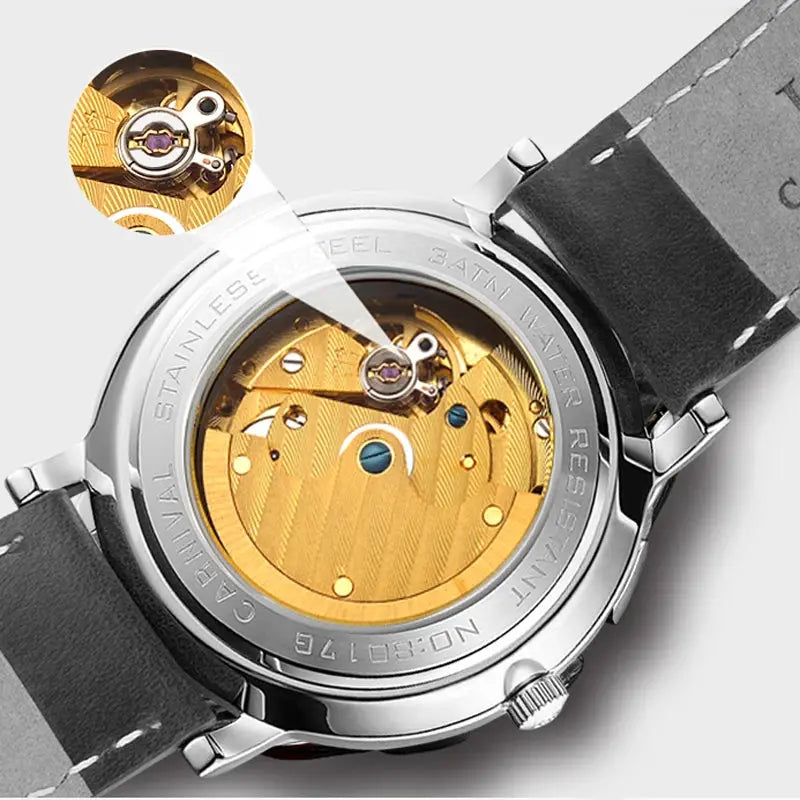 Carnival men's automatic skeleton watch with stainless steel case and visible gold-tone movement.
