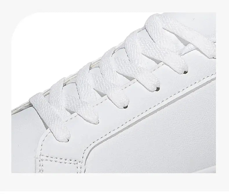 White PU leather sneakers with lace-up closure, casual men’s footwear