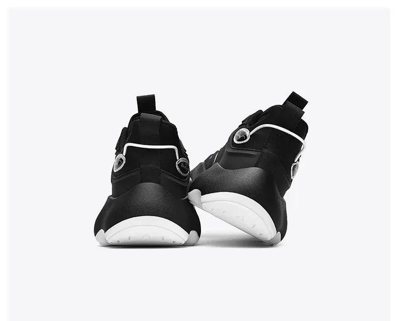 Pair of men's black sneakers with white sole, breathable casual trainer shoes
