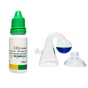 CO2 indicator solution bottle for aquarium with green cap beside glass drop-checker showing blue liquid