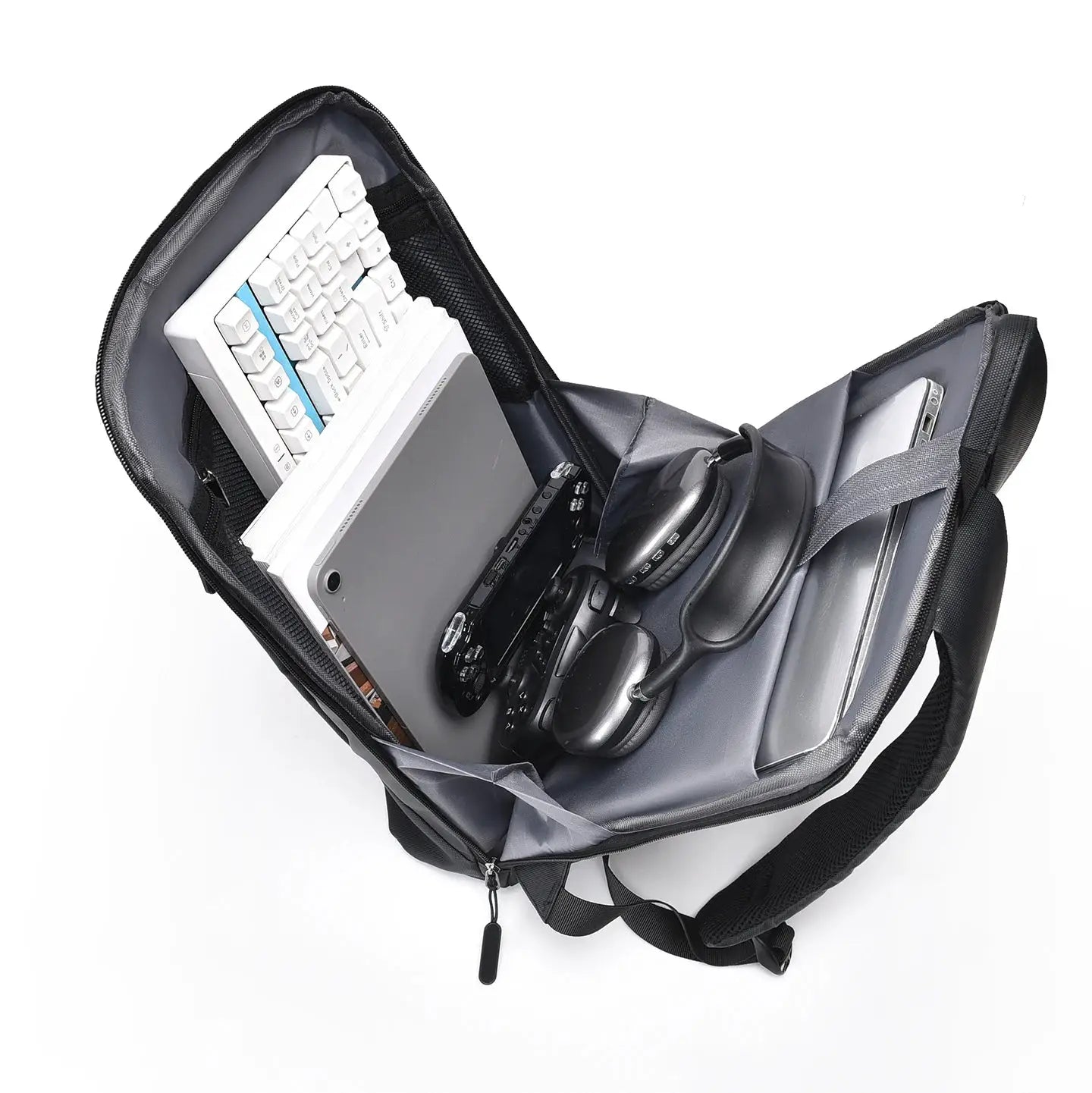 Interior view of a lightweight laptop backpack with a laptop, keyboard, and accessories organized inside.