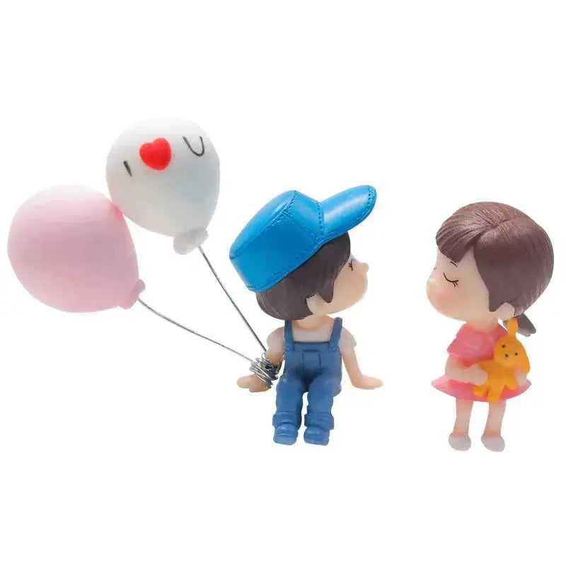Car decoration figurine pair of cute couple with blue cap boy and pink dress girl, holding pink and white balloons