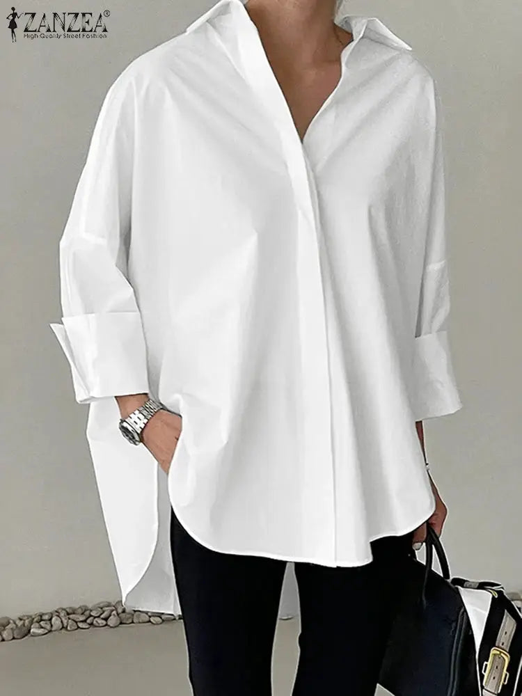 ZANZEA oversized white blouse with turn-down collar, long sleeves, high-low hem.