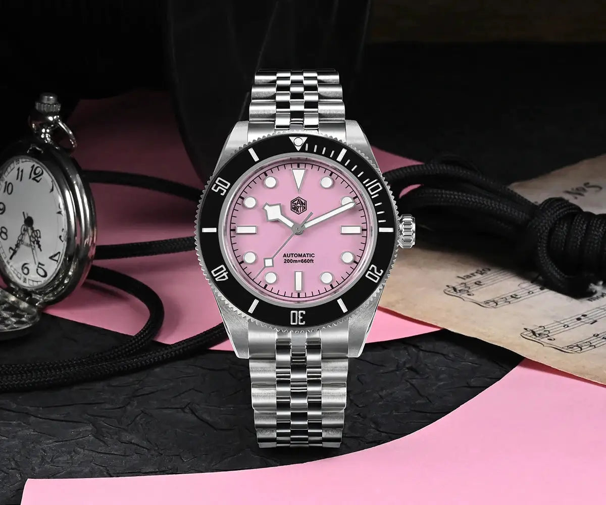 San Martin BB Diver watch, 40mm, pink dial, stainless steel bracelet, black bezel; two watches in scene