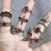 Goth Punk Open Ring Set with red crystal heart and cross motifs on silver-tone bands