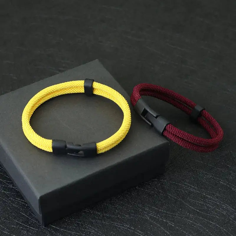 Men's double-layer thread bracelet pair in yellow and burgundy with detachable stackable design and zinc alloy clasps