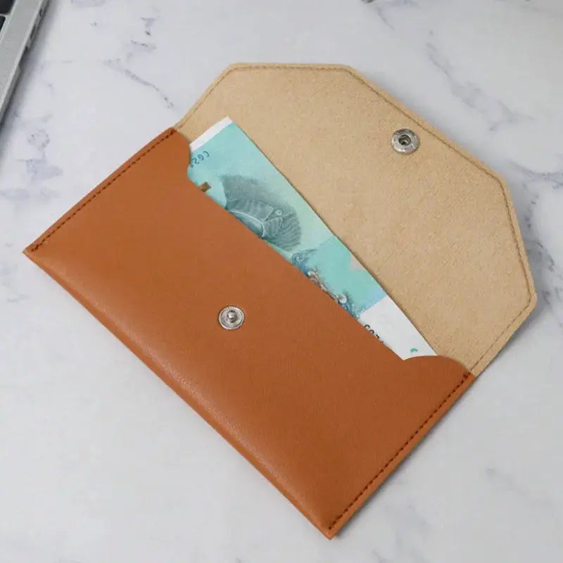 Leather wallet, envelope-style with snap closure, brown exterior and tan interior, holds cash and cards