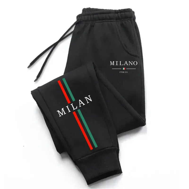 Men's black Milan-printed jogger pants with red and green side stripes and drawstring waist
