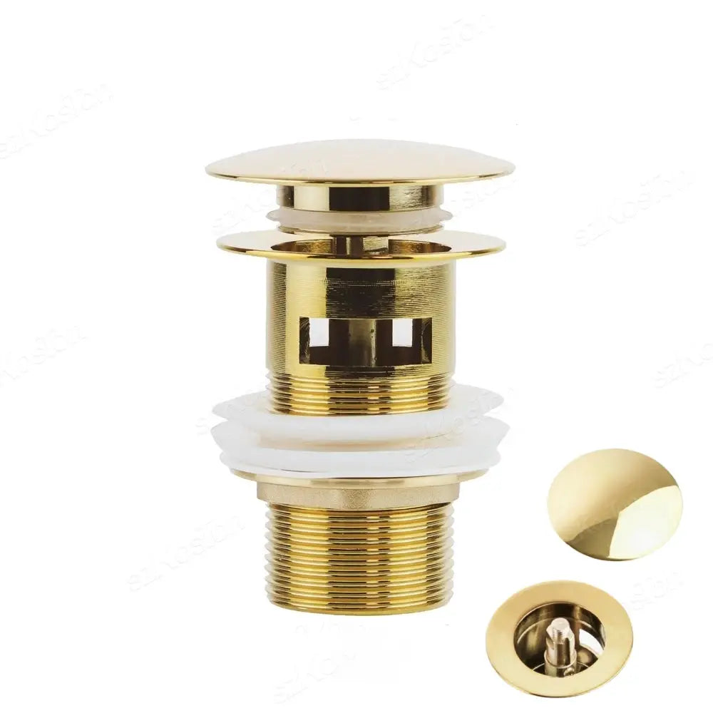 Gold brass pop-up bathroom sink drain stopper with white gasket and threaded outlet.