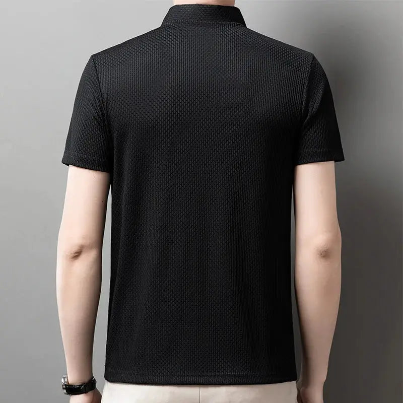 Men's black textured short-sleeve polo shirt, ideal for business casual outfits