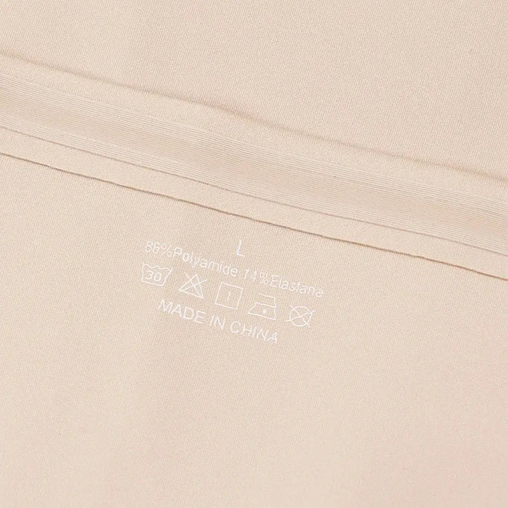 Simples Market strapless tube top bra inner label on beige fabric; size L, 88% polyamide 12% elastane; Made in China
