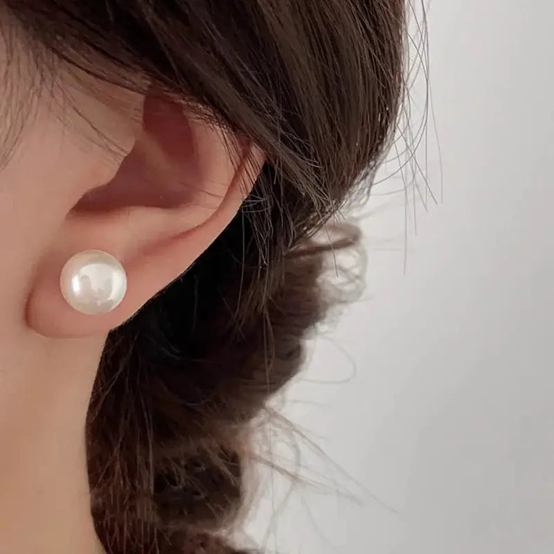 Pearl stud earrings in 925 sterling silver for women; white lustrous pearls
