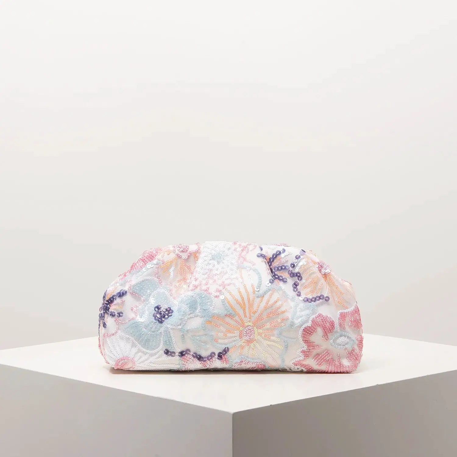 Clutch bag with pastel sequin floral embroidery, pink, blue, and lavender accents