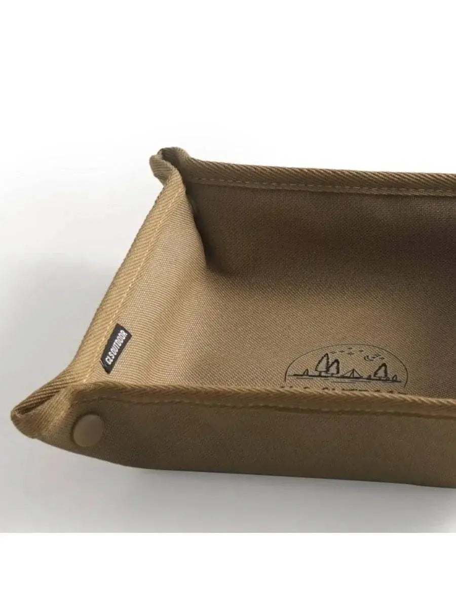 Portable camping organizer tray by Simples Market in tan canvas, compact travel storage box.