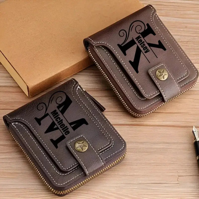 Two personalized PU leather bifold wallets for men, engraved names, brown, zip-around closure with snap strap.