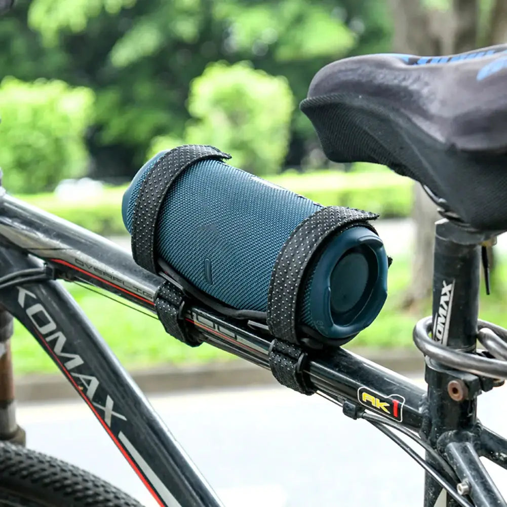 Bike speaker mount with adjustable straps for blue JBL Flip 6/5 or Charge 5 on a bicycle frame