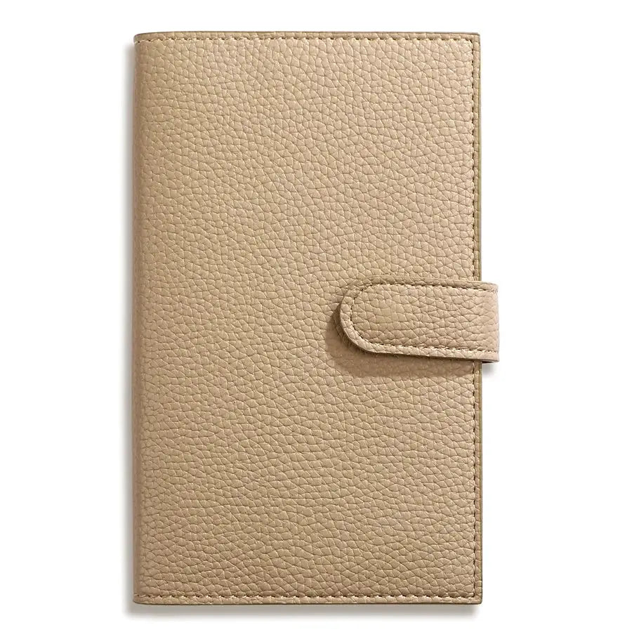 A6 Weekly Planner Notebook with tan pebbled leather cover and strap closure