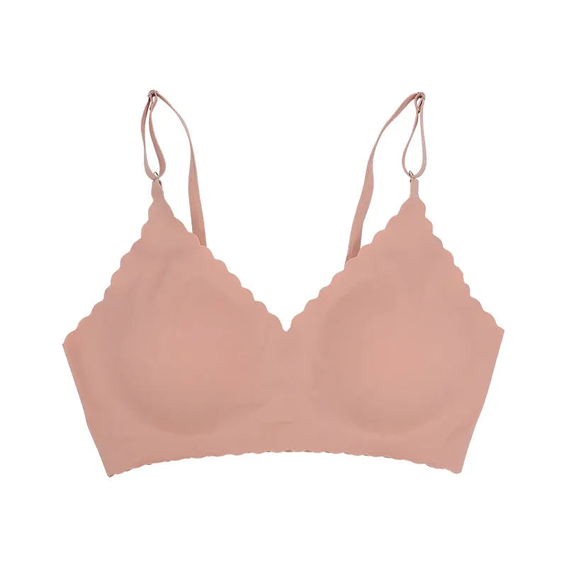 Wireless padded bra in nude pink with scalloped wavy edge and adjustable straps