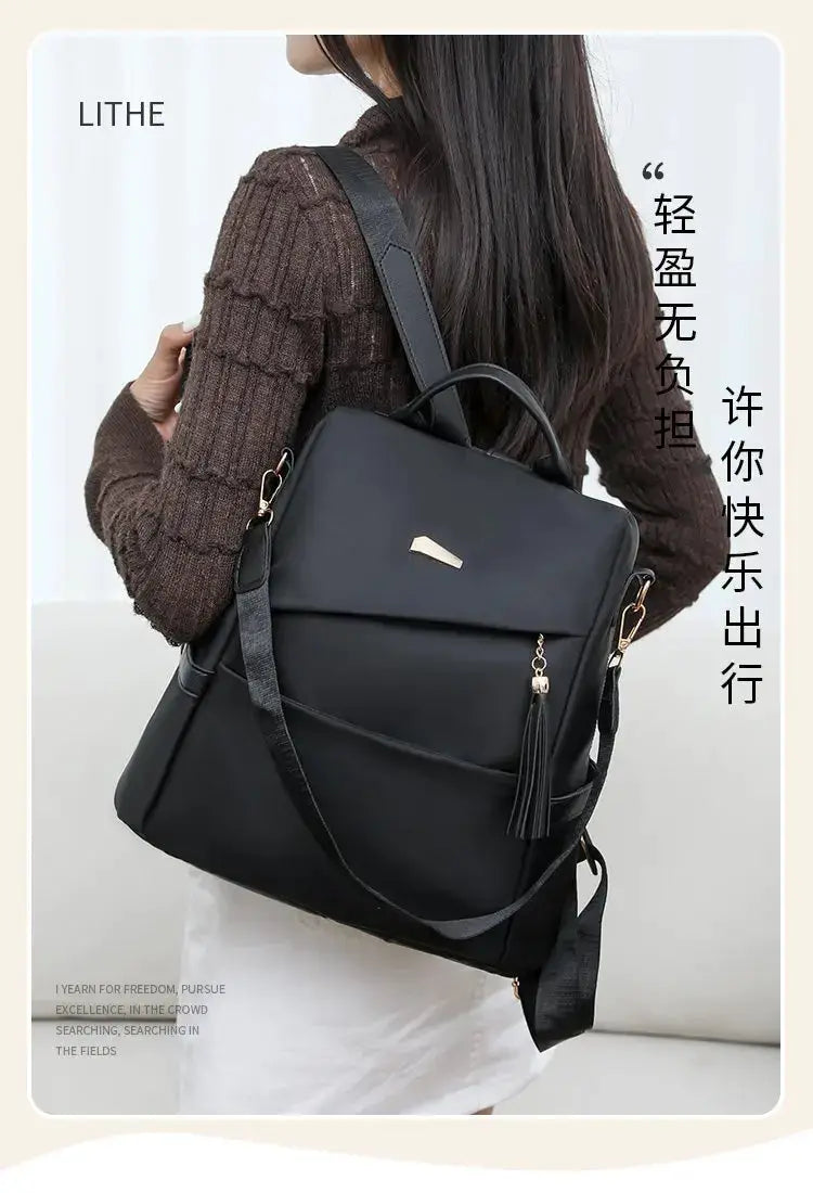 LITHE nylon anti-theft backpack, black with tassel charm, large capacity