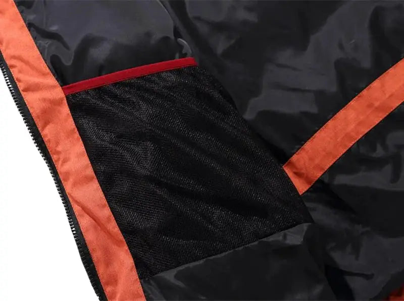 Men's black Simples Market down jacket with orange piping and mesh panel