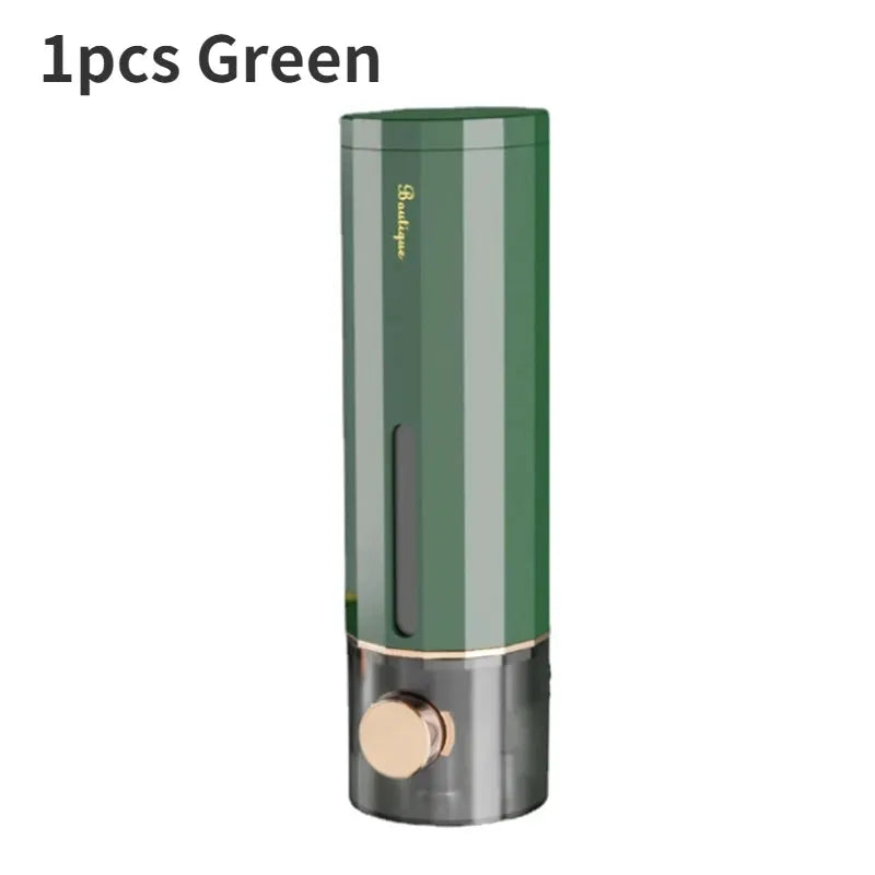 Manual green wall-mounted bathroom soap dispenser with gold-toned base and pump