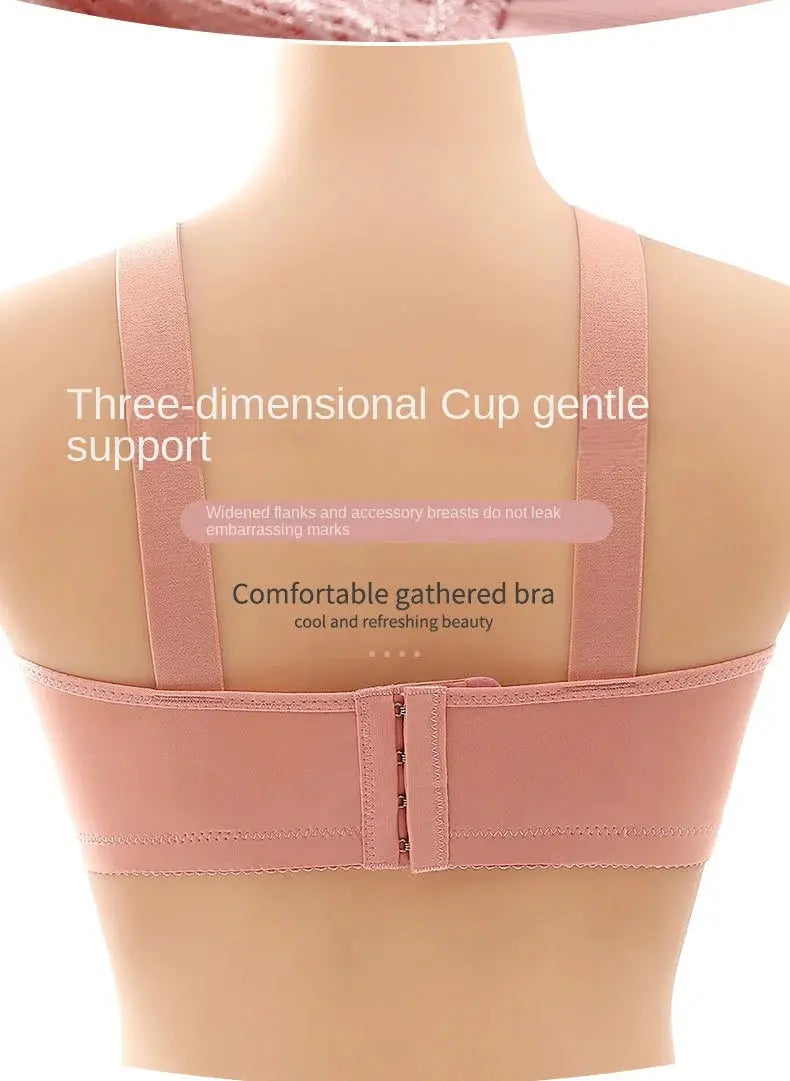 Pink women's bra with back hook closure, no underwire, wide straps