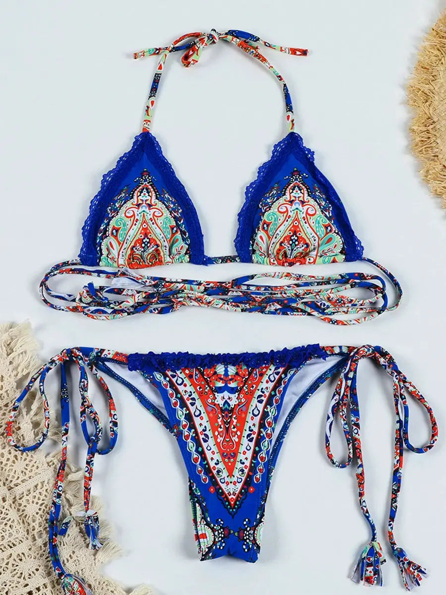 Two-piece bikini set in blue with paisley print, lace trim, and tie-side bottoms