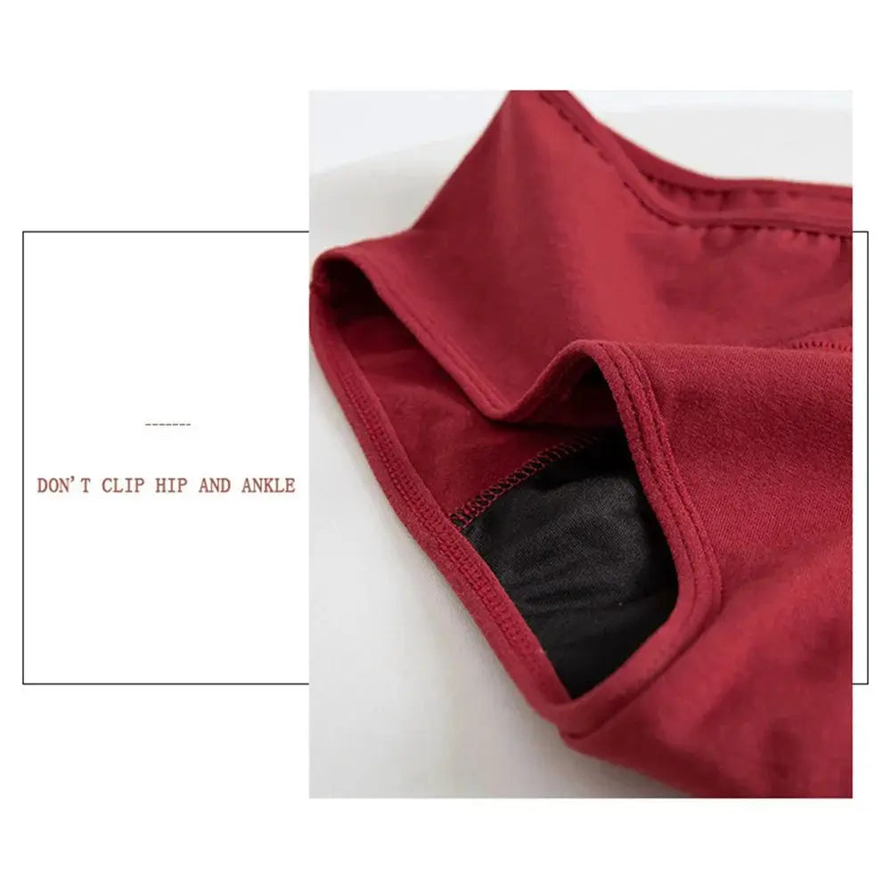 Menstrual panties; red low-rise cotton briefs with black inner gusset.