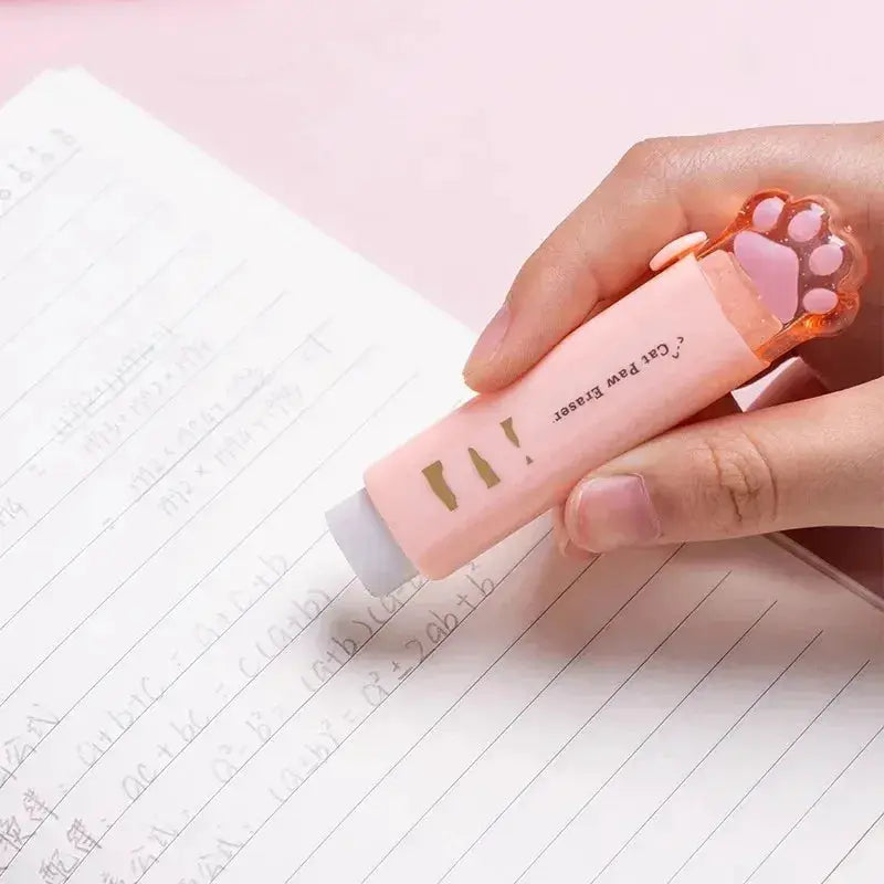 Cat paw retractable eraser with push-pull design in pink and orange cap; portable student stationery