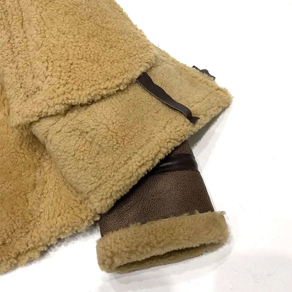 Men's sheepskin shearling fur jacket with beige fleece and brown leather cuff