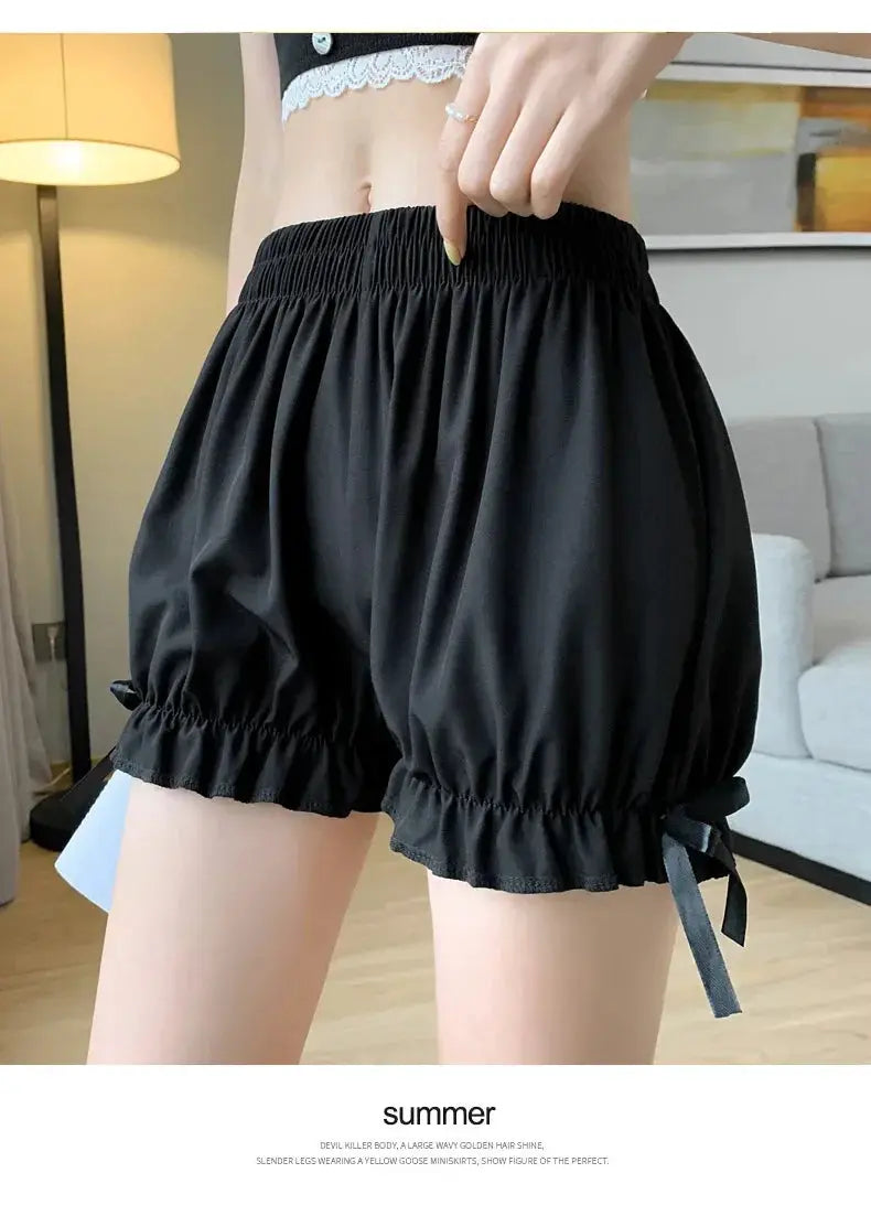 Simples Market black satin bloomers with elastic waist, gathered ruffled hems and side bow ties