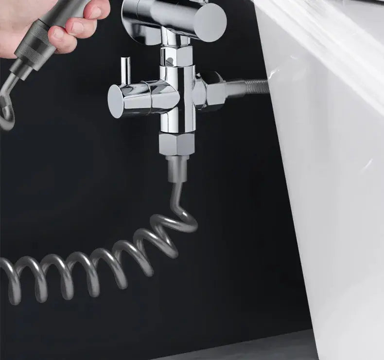 Simples Market chrome handheld bathroom bidet sprayer set with dual-mode spray and coiled hose.