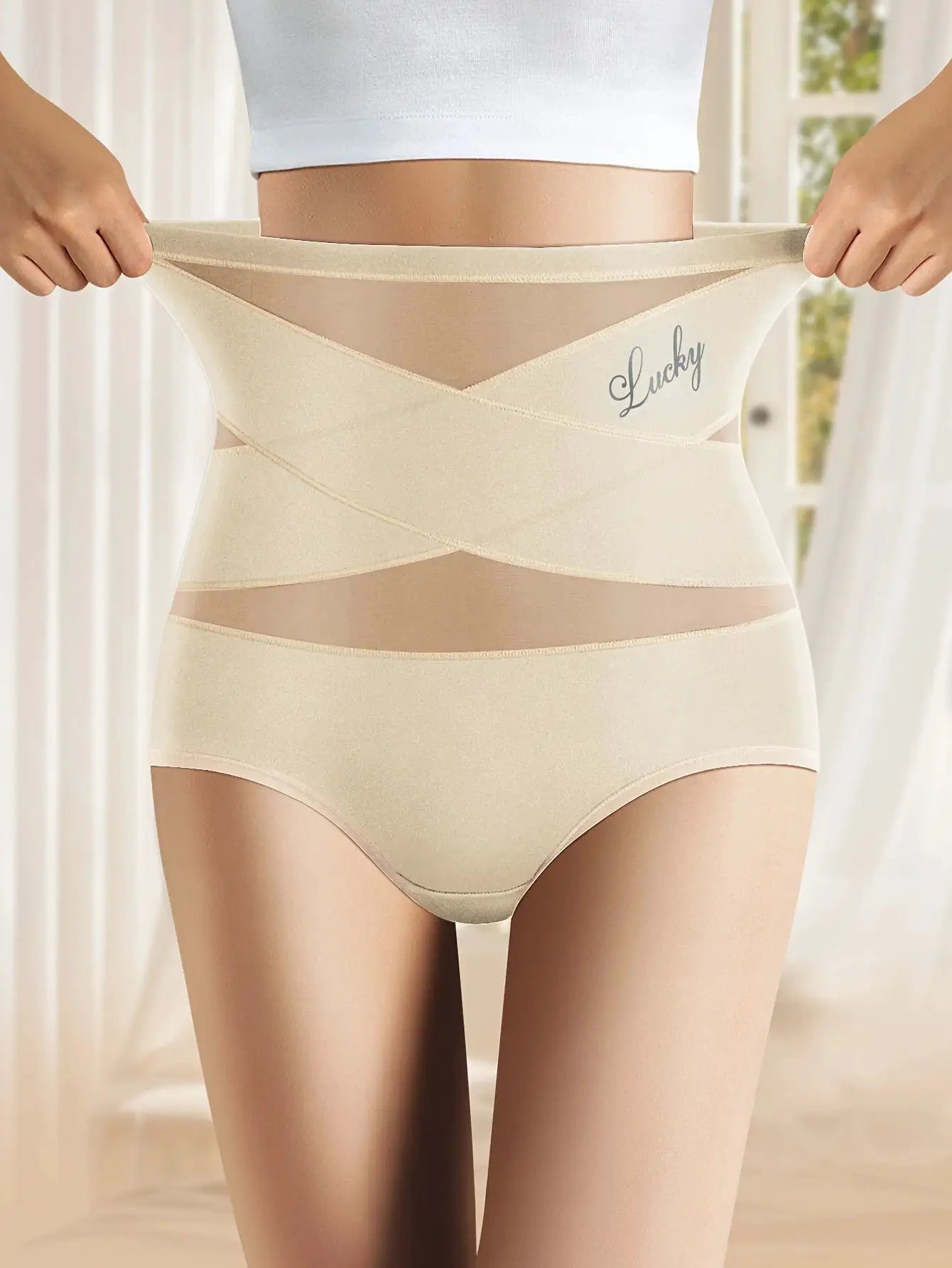 Beige high-waisted panties with cross-tummy cinch, breathable mesh ice-silk fabric; Lucky logo.