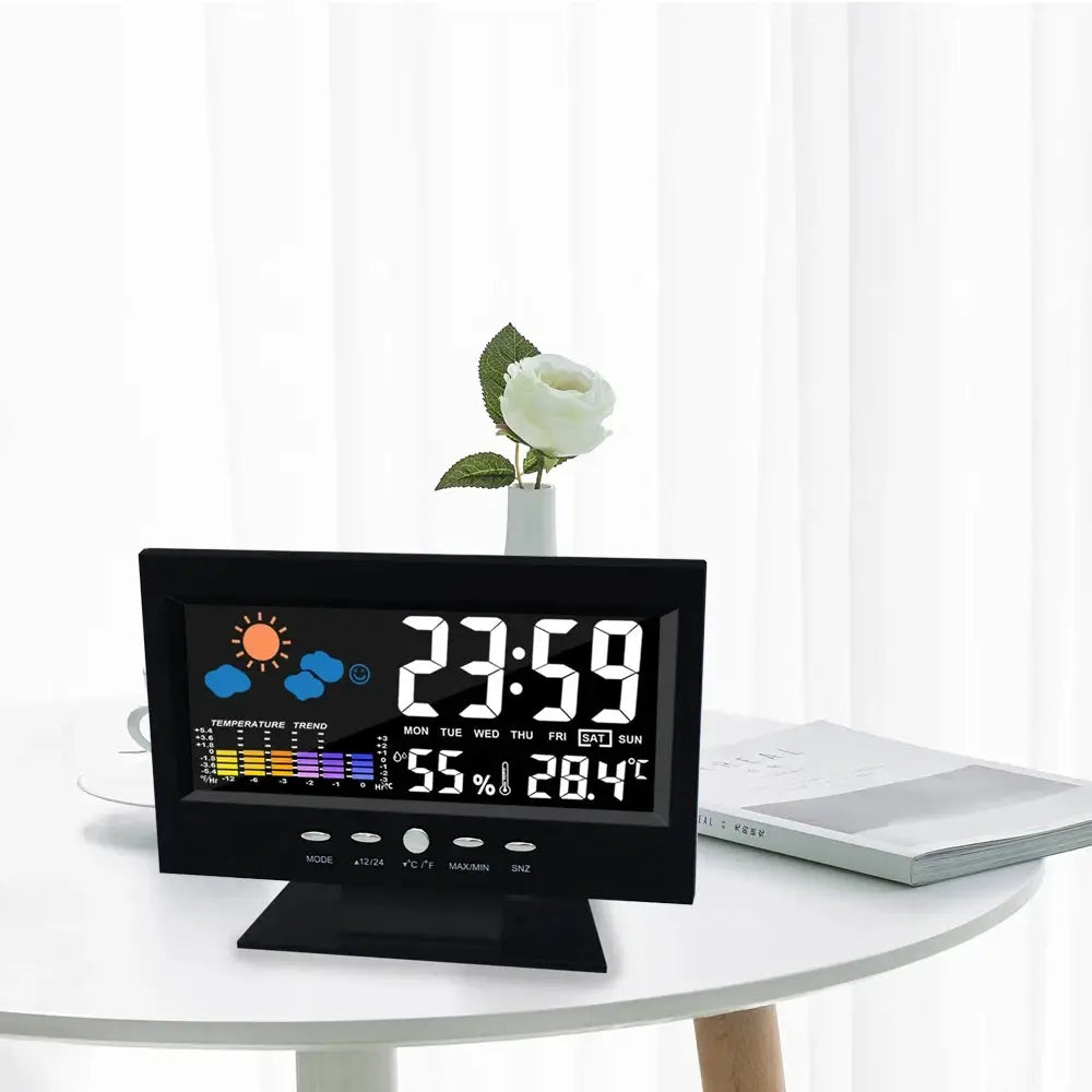 Black multi-functional digital LCD weather station clock with large time display plus temperature and humidity readings