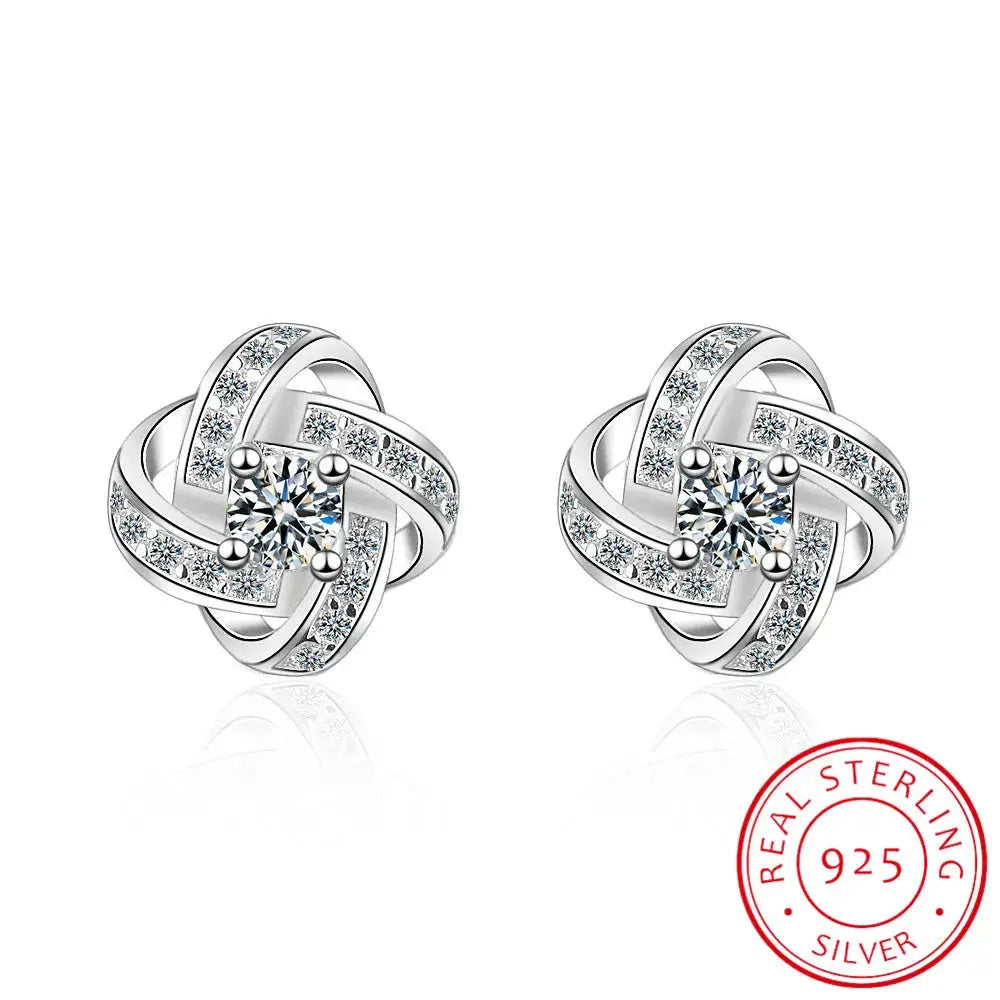 Pair of 925 sterling silver zirconia earrings for women with a twisted knot design