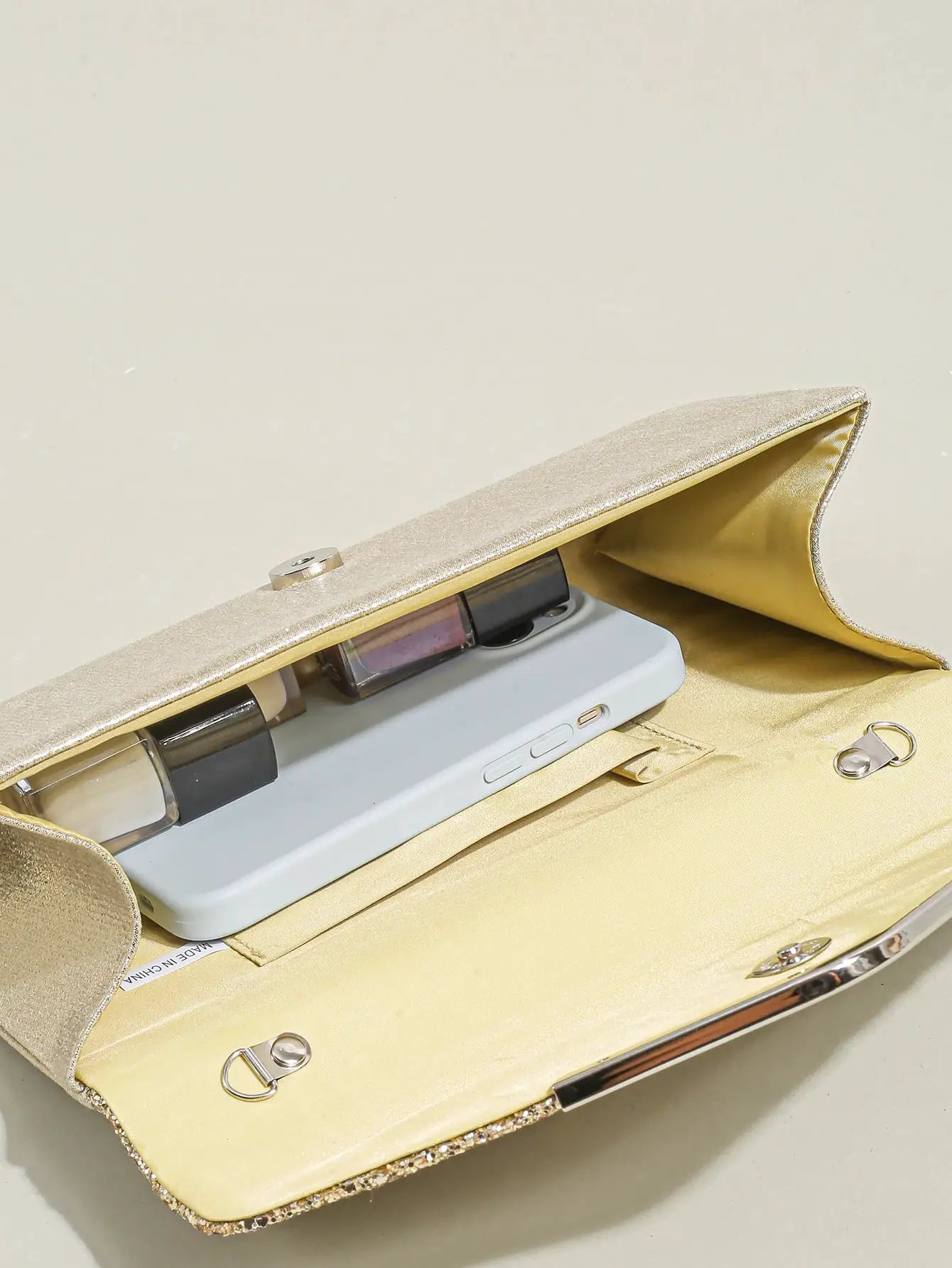 Gold sequin envelope clutch purse with chain shoulder strap and satin interior for party events