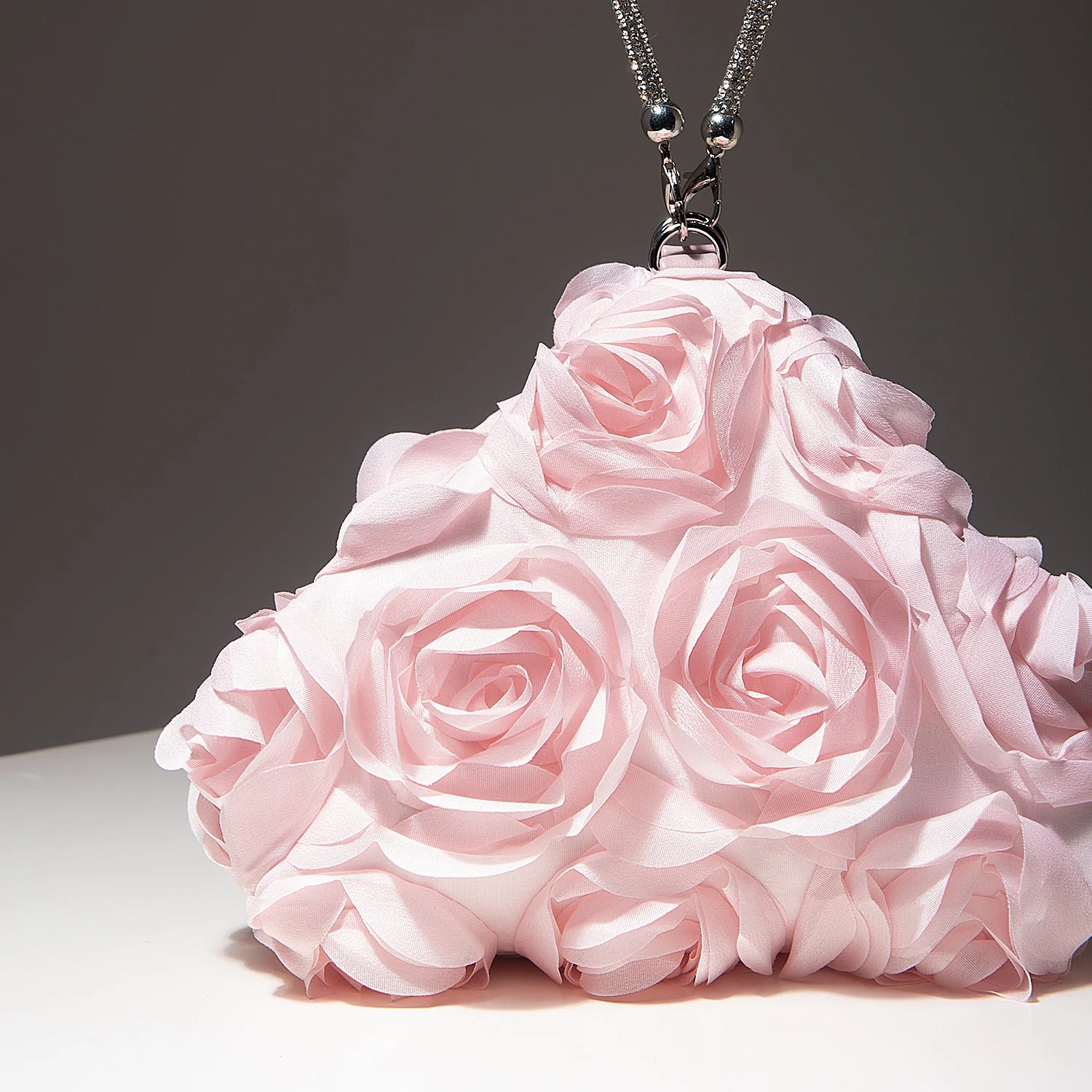 Pink floral mini purse necklace with fabric rose petals and a silver chain