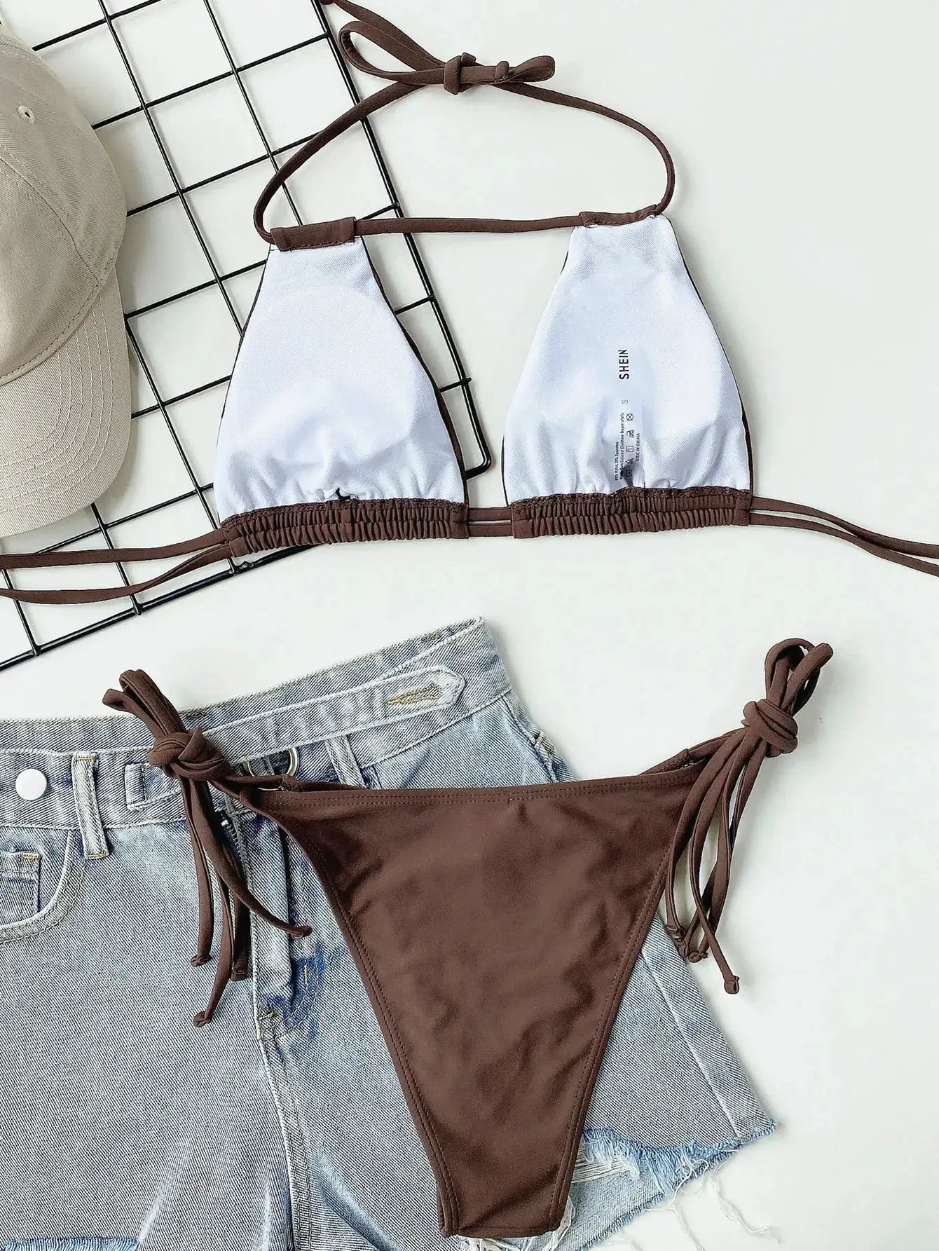 Simples Market two-piece bikini set with white triangle cups, brown halter straps, and brown string-tie bottoms