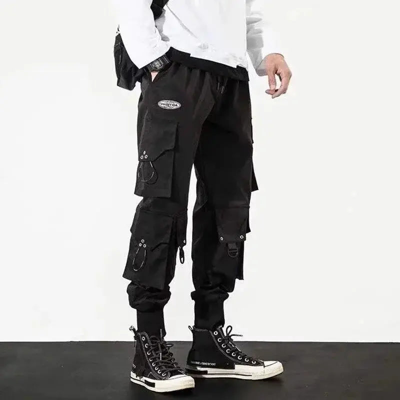 Simples Market men's black cargo pants with multiple pockets, loops and buckle straps