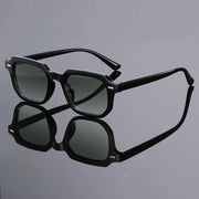 Men's black square-frame sunglasses with gradient lenses and retro rivet details, festival-ready