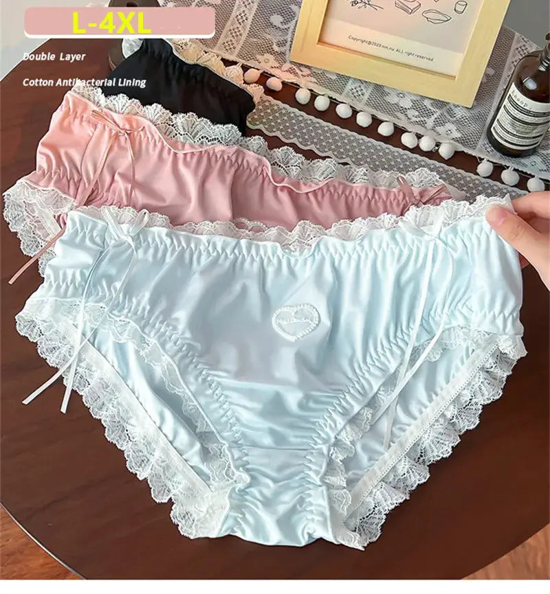 Set of 3 plus-size lace panties in blue, pink, and black with white lace trim.