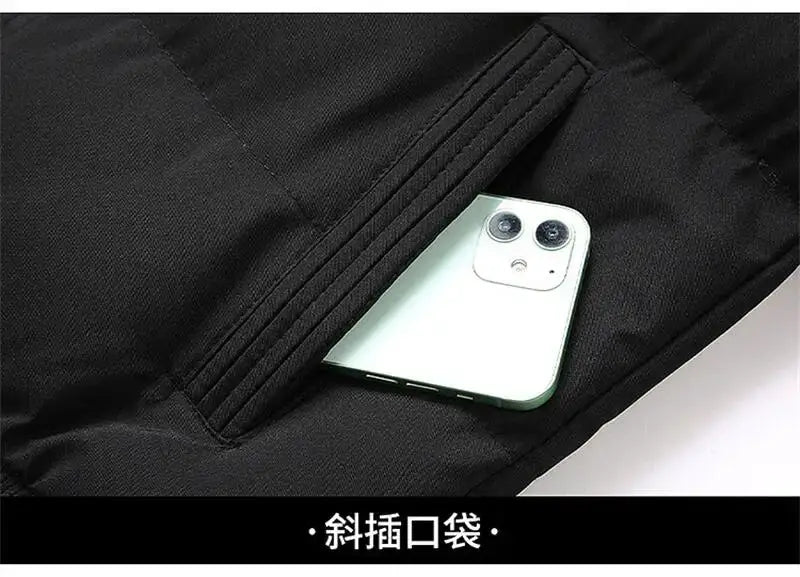 Men's black down jacket with a slanted pocket holding a phone.
