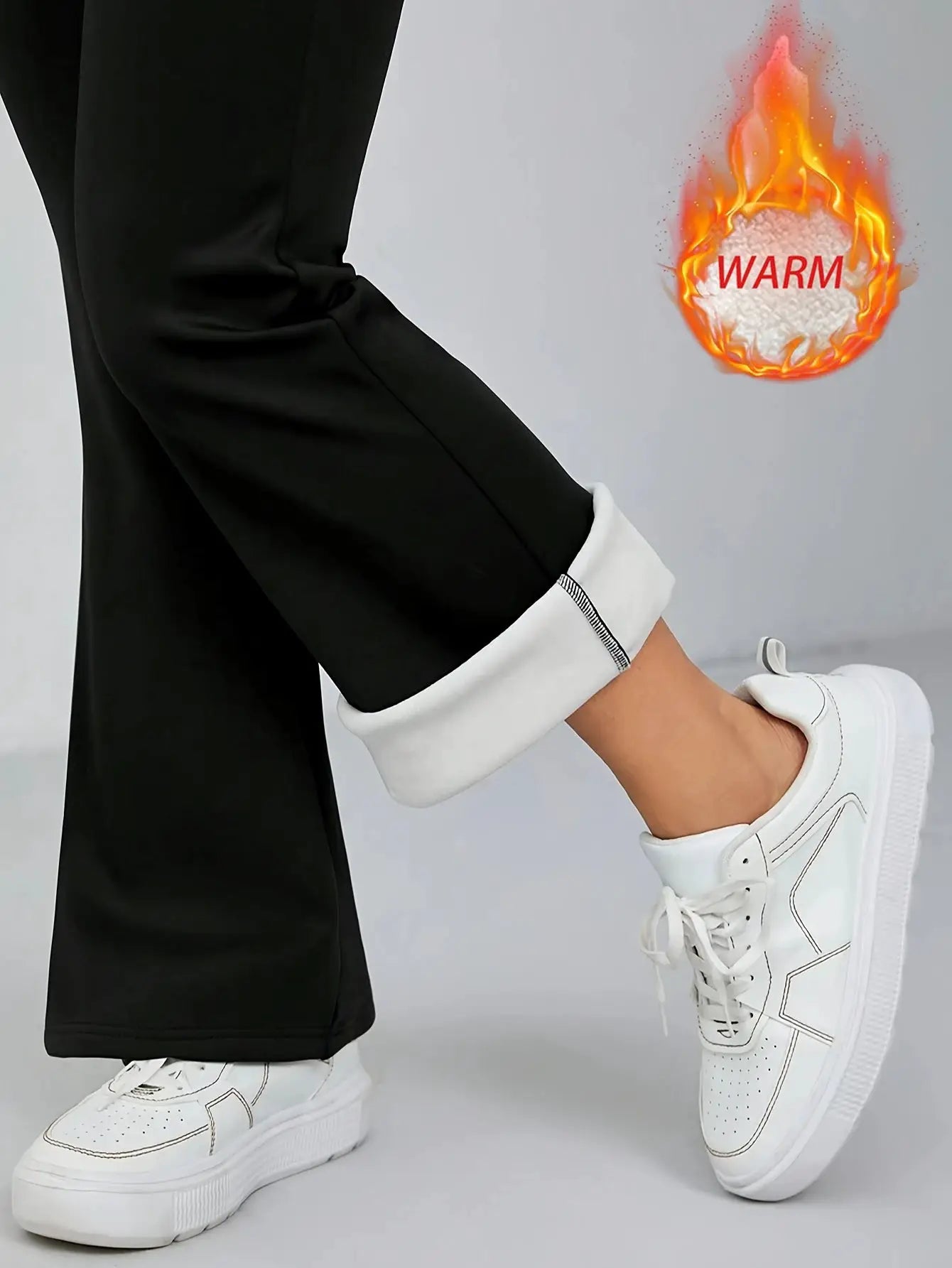Women's black wool-lined bell-bottom pants by Simples Market; warm winter pants with plush lining.