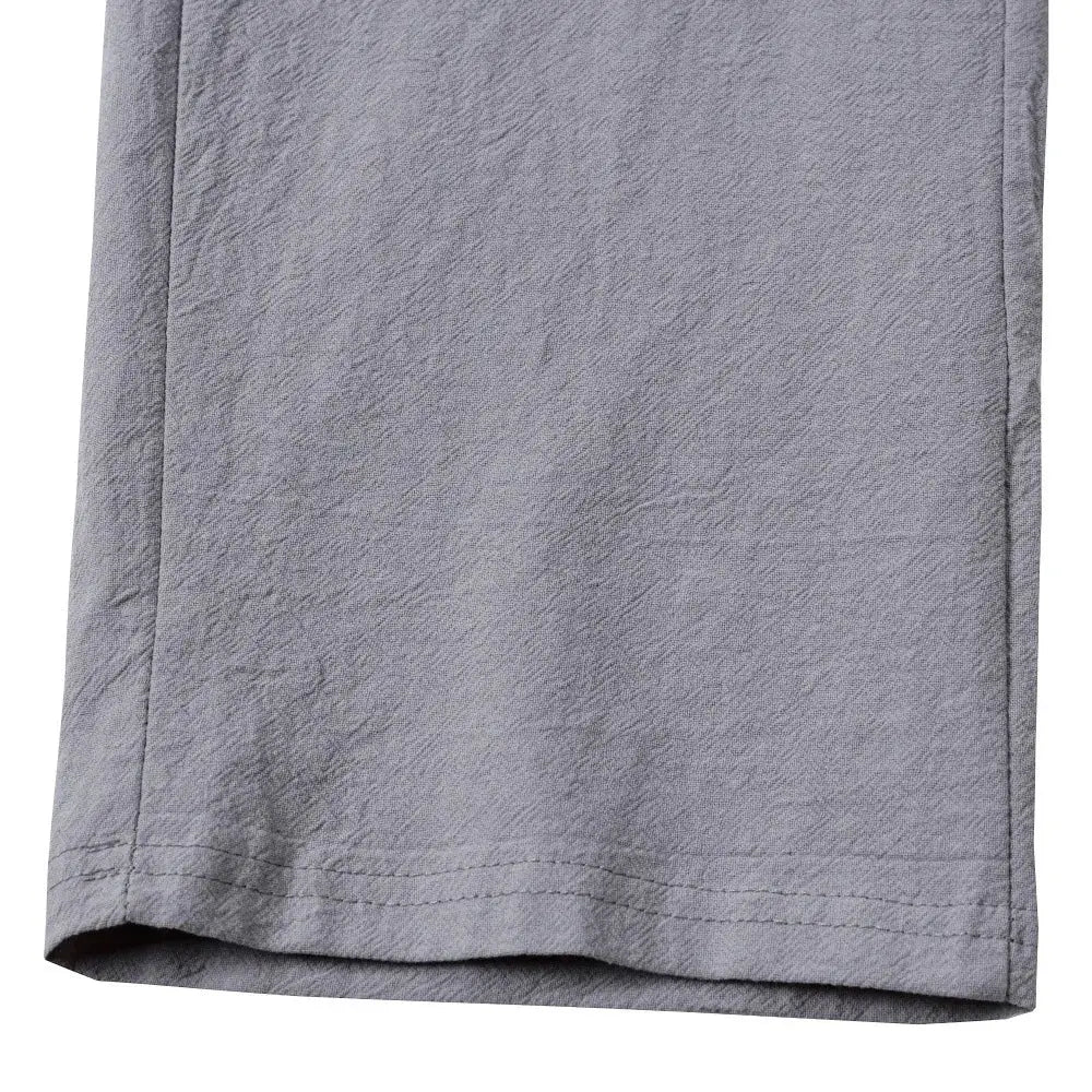 Men's gray casual trousers with clean hem and side seam details