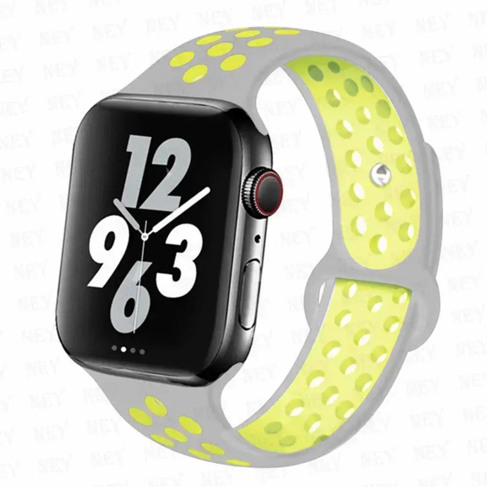 Silicone sport strap for Apple Watch, gray exterior with neon yellow perforated inner, fits 38–45mm for active wear