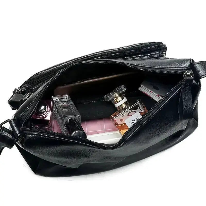 Simples Market black leather crossbody bag with large capacity and multiple compartments