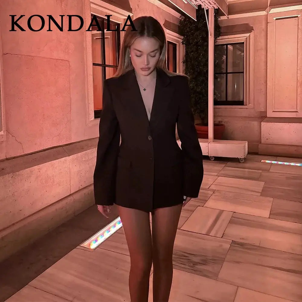 KONDALA black blazer set with matching shorts worn by a model; tailored chic suit