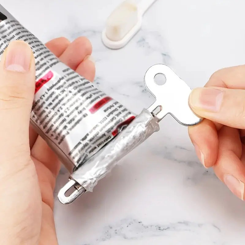 Stainless Steel Toothpaste Squeezer and Rotating Dispenser for Hair Oil Paint Ointments Cosmetics Bathroom Accessories