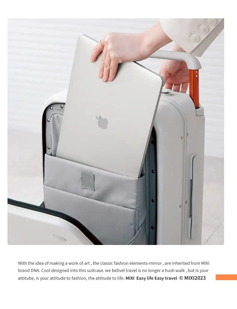 Mixi 20-inch carry-on suitcase by Simples Market in light gray with aluminum frame; laptop inserted into front pocket